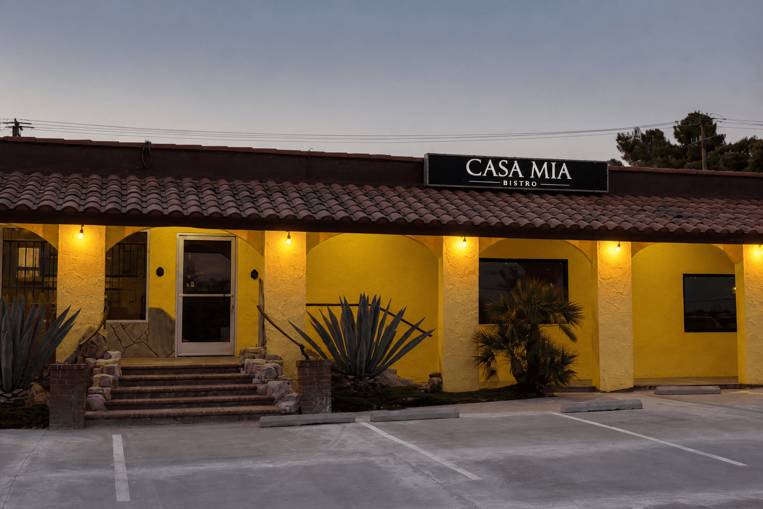 Casa Mia Bistro exterior on 7th Street in Victorville at dusk
